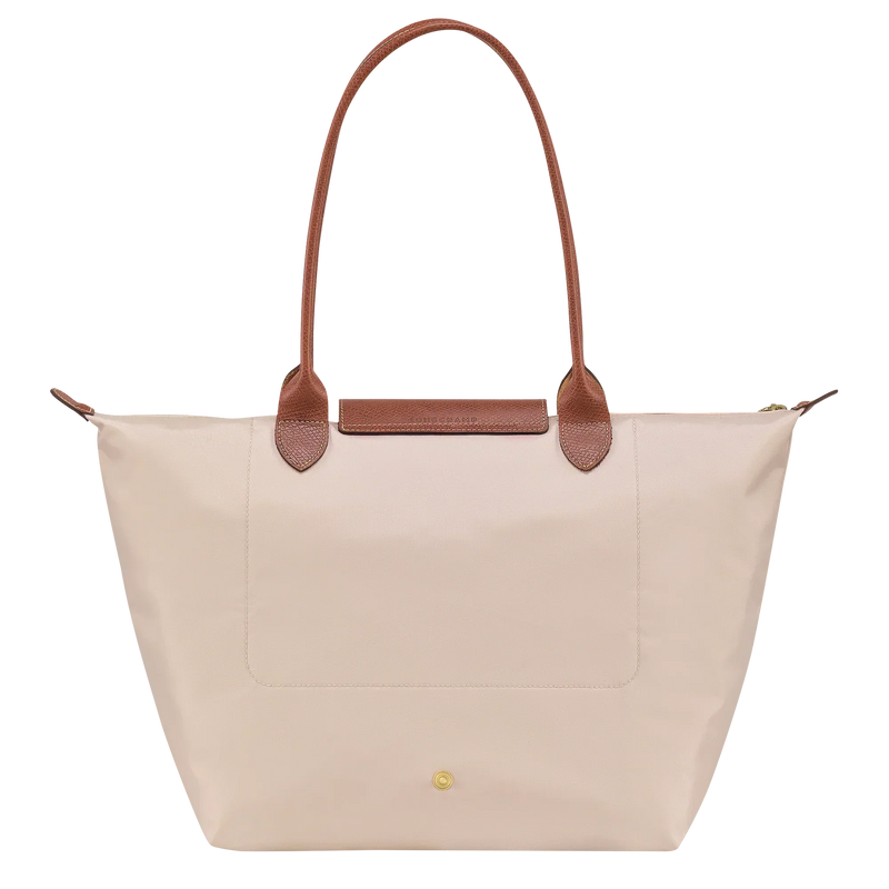 Bolso Grande Premium, Papel