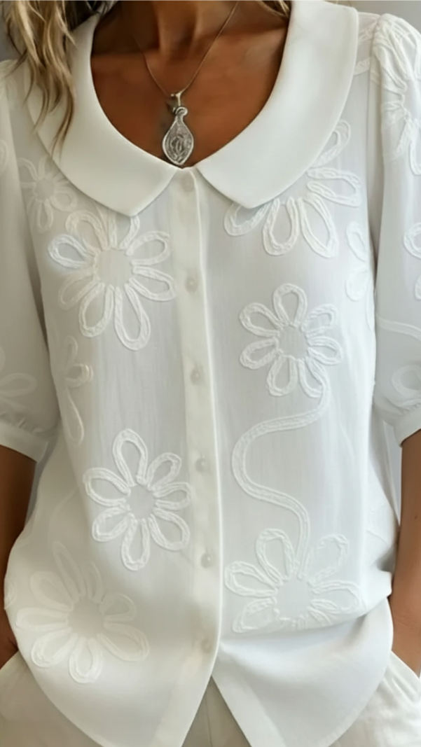 Blusa elegante Fiora con bordado floral