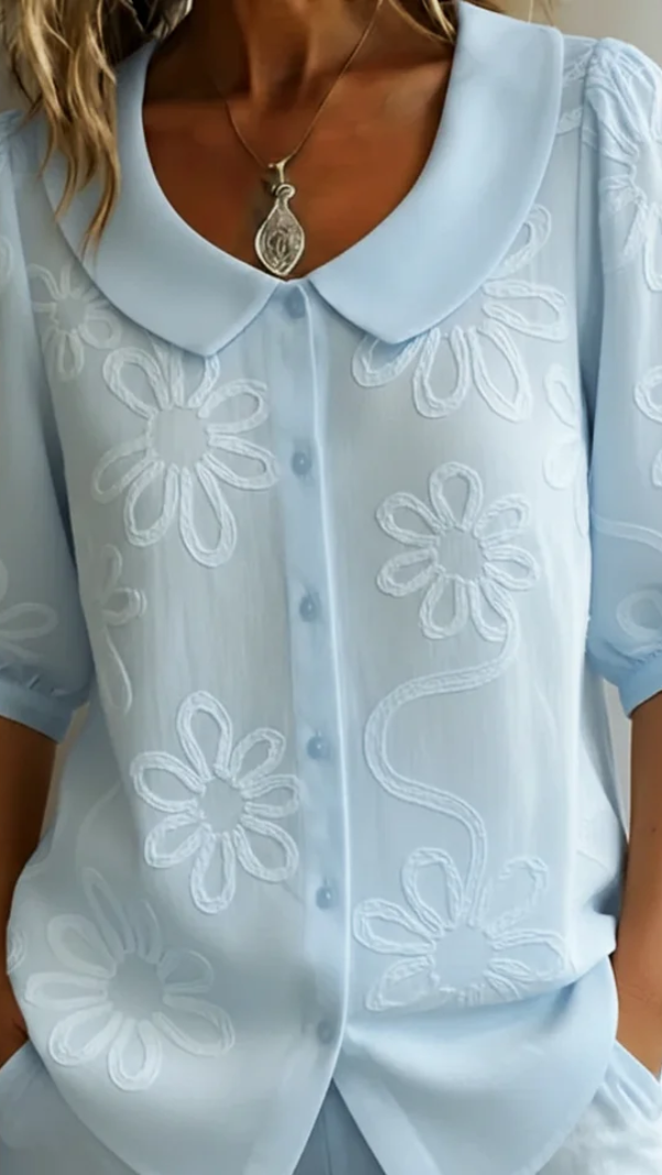 Blusa elegante Fiora con bordado floral