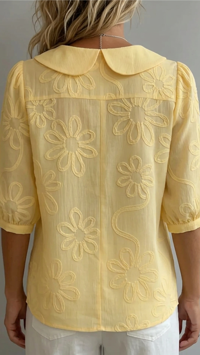 Blusa elegante Fiora con bordado floral